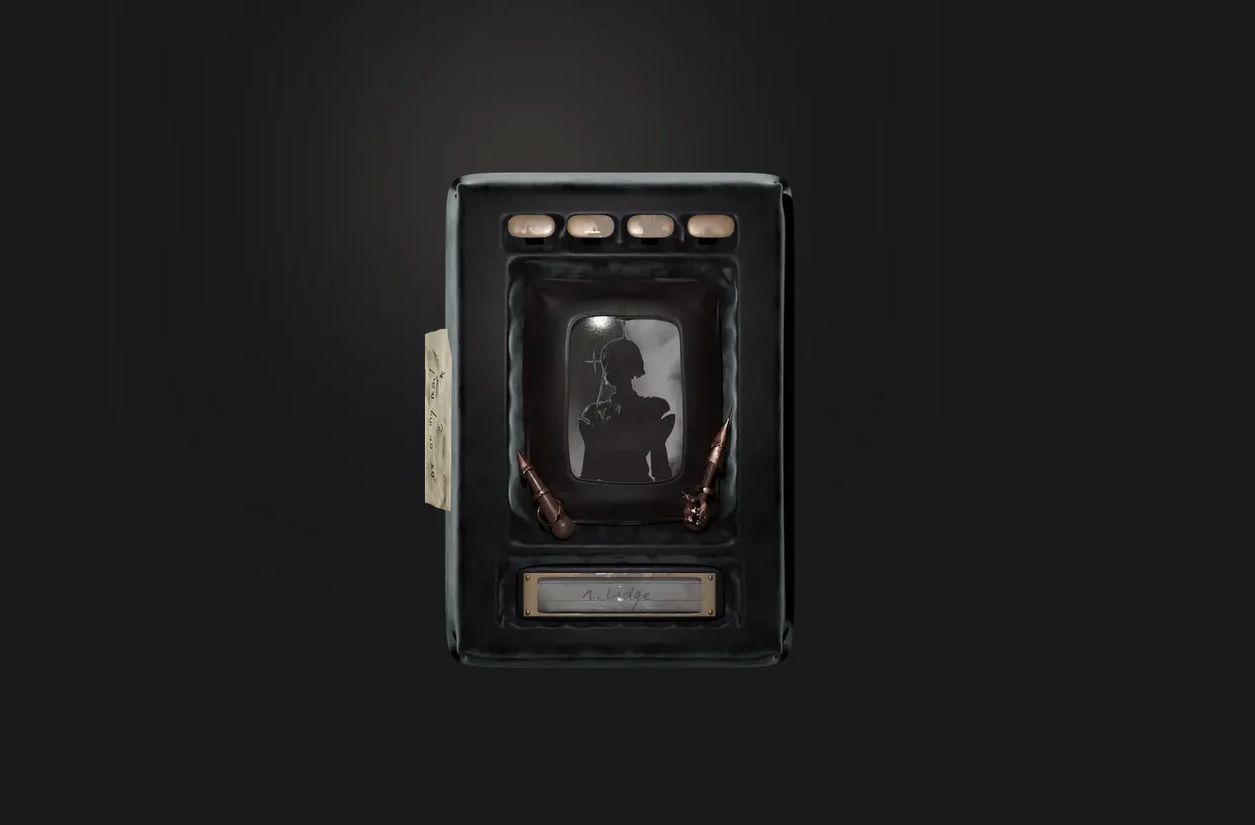 The player: a black handheld case with brass keys and a handwritten note taped over it